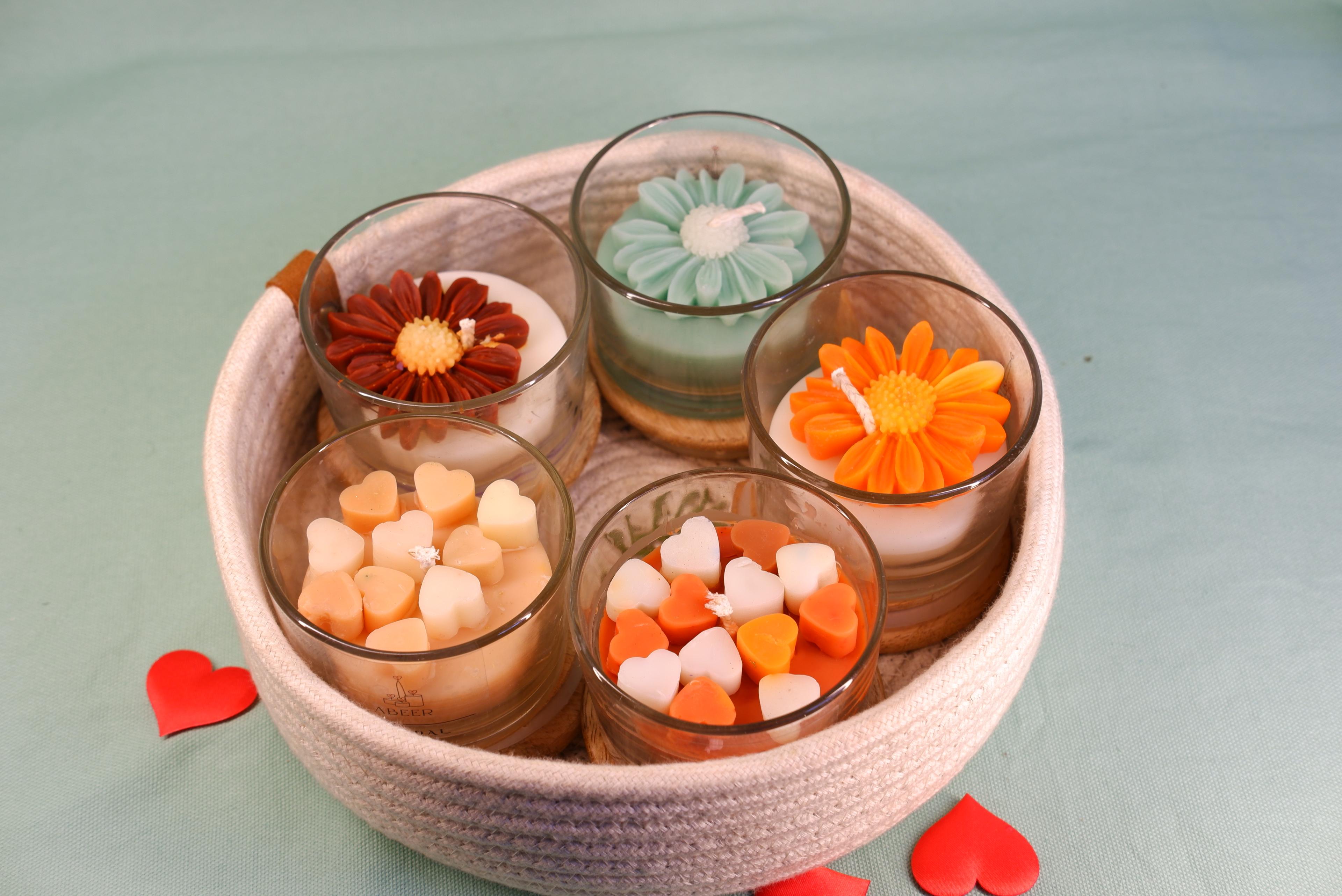 A beautiful luxury candle on a marble countertop.